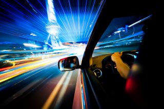 iStock_000018050430_Full; Car Driving in a Night Scene