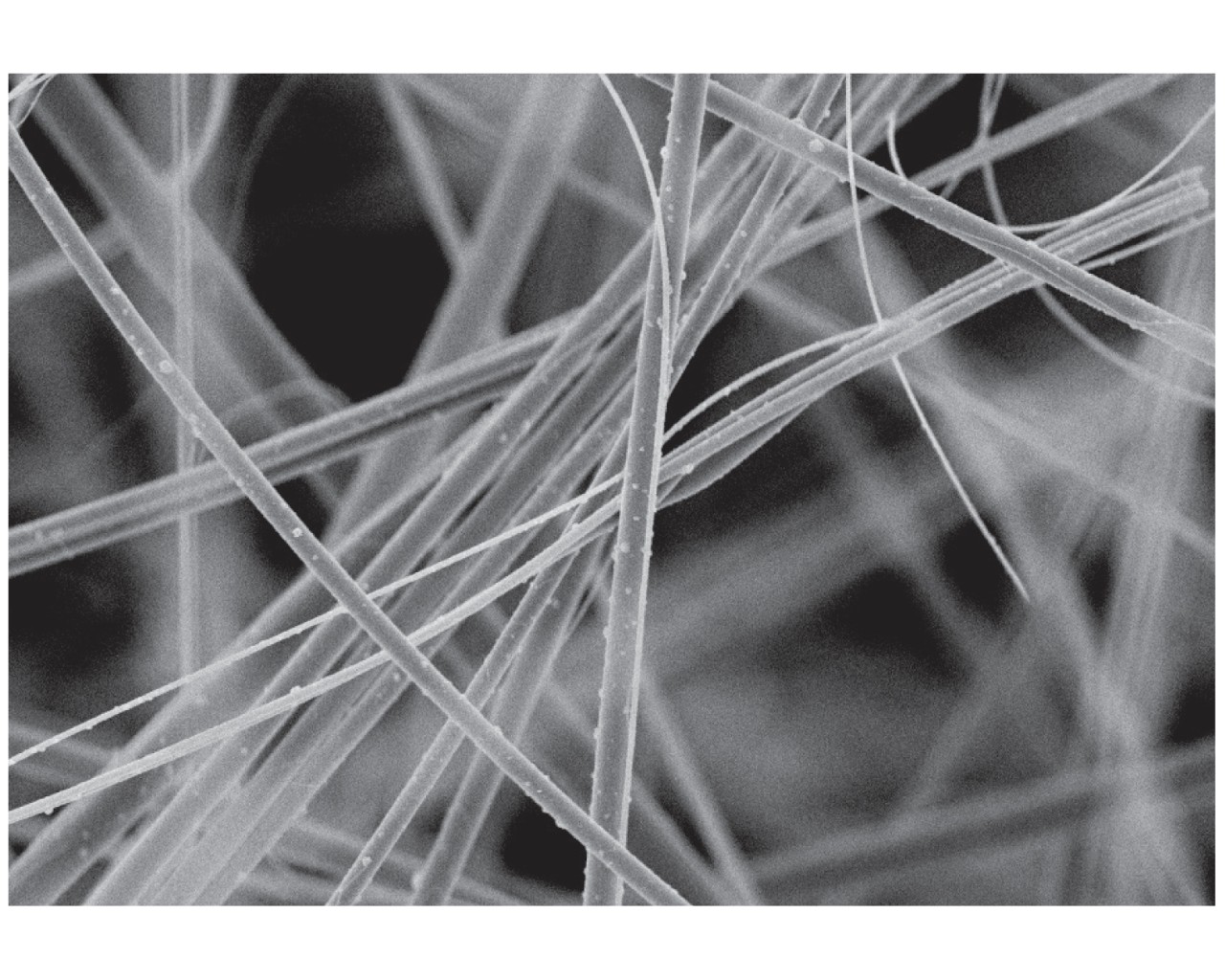  Figure 2. SEM image of all-glass, resin-free media magnified 1,000 times. 