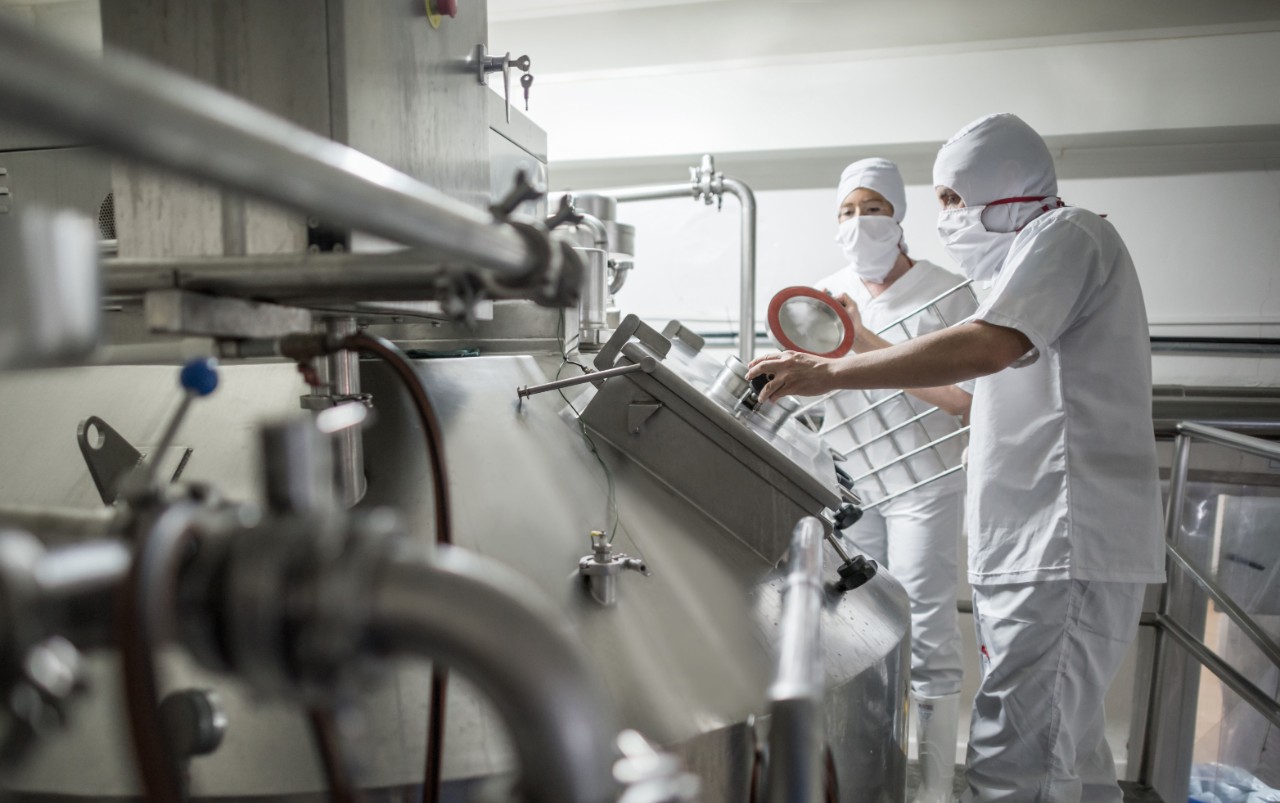 People in a dairy plant.